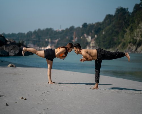 Group of people doing yoga and stretching in India